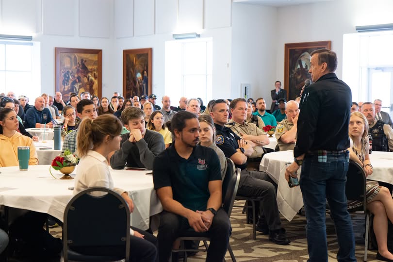 grossman speaking to crowd